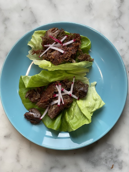 Pork and mushroom carnitas in lettuce wraps.