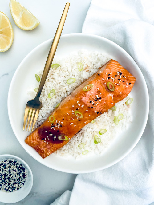 Sweet-spicy glazed salmon on white rice.