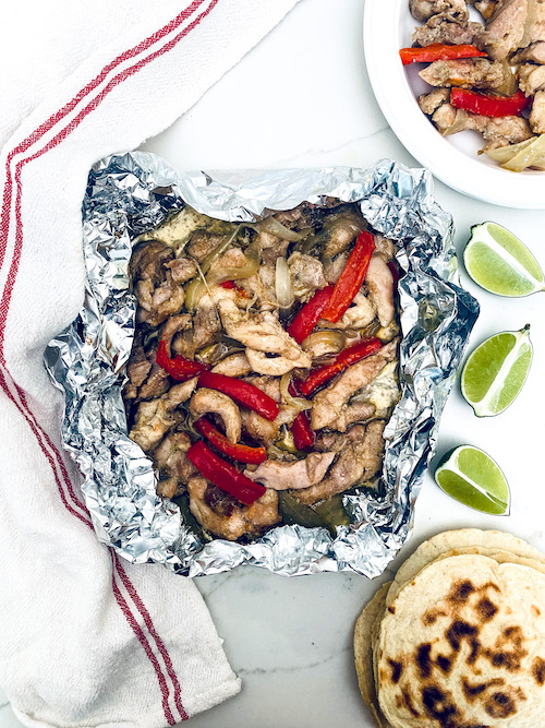 Chicken fajita filling in a foil packet.