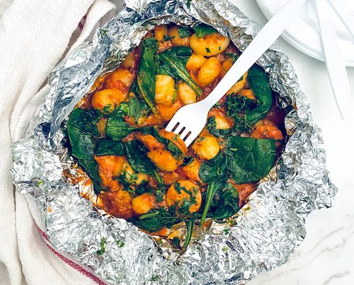 Gnocchi with sausage and spinach in a foil packet.