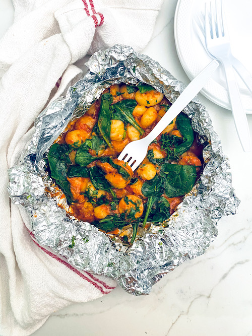Gnocchi with sausage and spinach in a foil packet.