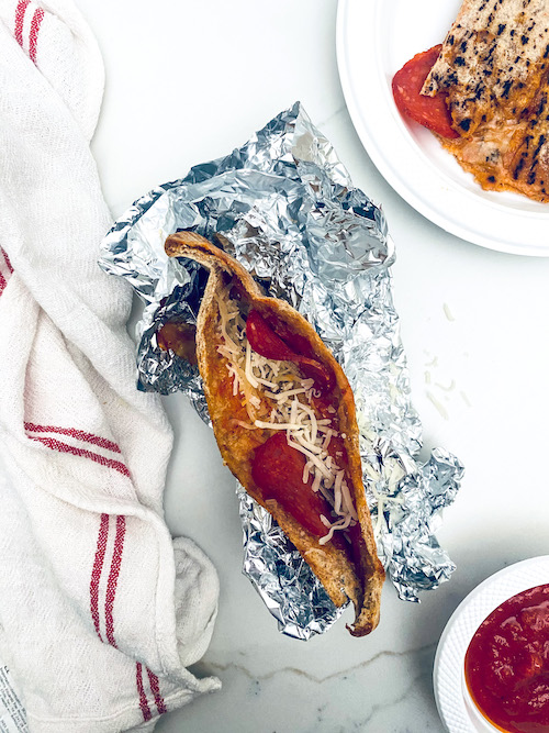Pita pizza pockets made in foil packs.
