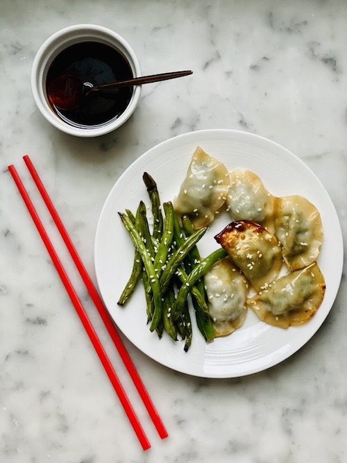 Honey-soy topped dumplings with roasted green beans.