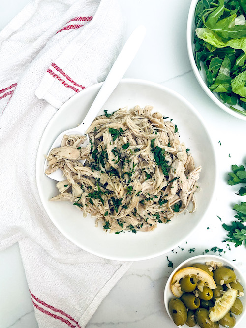 Italian shredded chicken topped with fresh parsley.