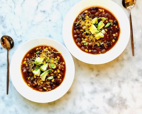 Two bowls of vegetarian chipotle chili.