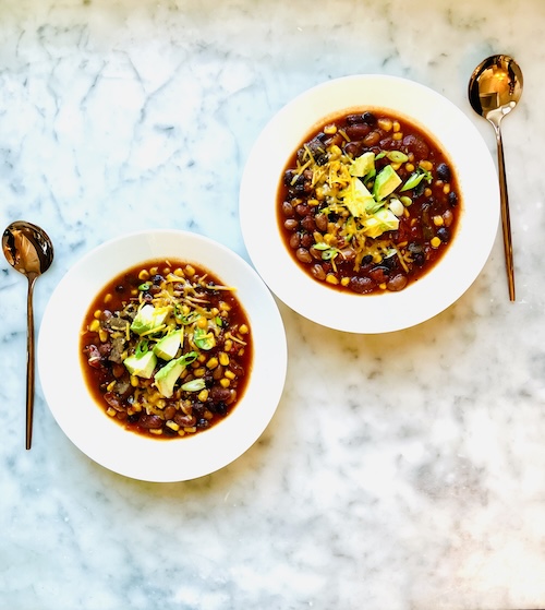 Two bowls of vegetarian chipotle chili.