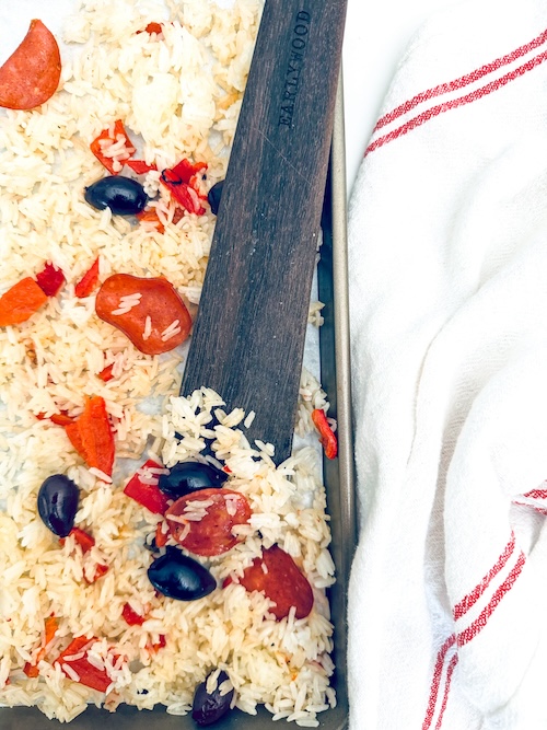 Antipasto fried rice on a sheet pan.