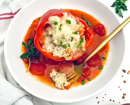 Chicken cheesy stuffed pepper in a bowl.
