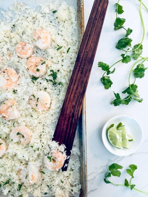 Garlic butter shrimp and rice on a sheet pan.