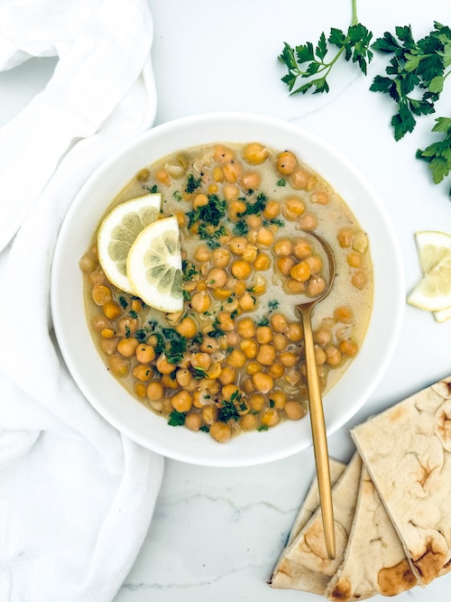Chickpeas and cheese in a bowl.