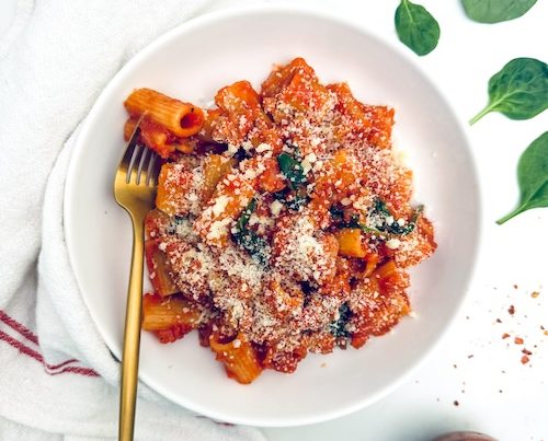 Sausage pasta marinara in a bowl.