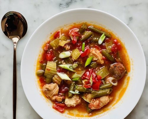 Chicken and sausage gumbo in a bowl.