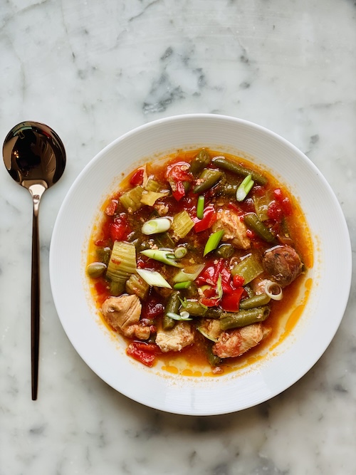 Chicken and sausage gumbo in a bowl.