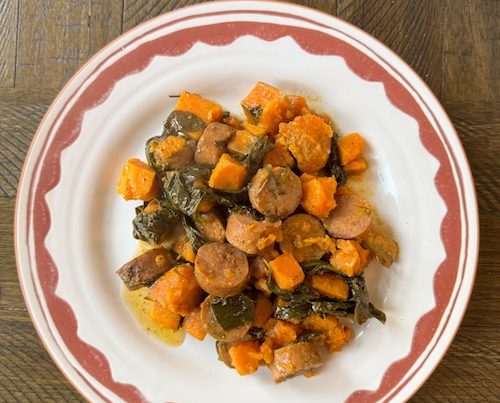 Sausage sweet potato hash in a bowl.