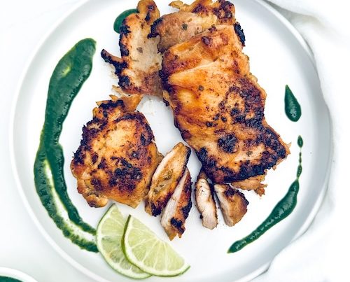 Peruvian grilled chicken on a plate.