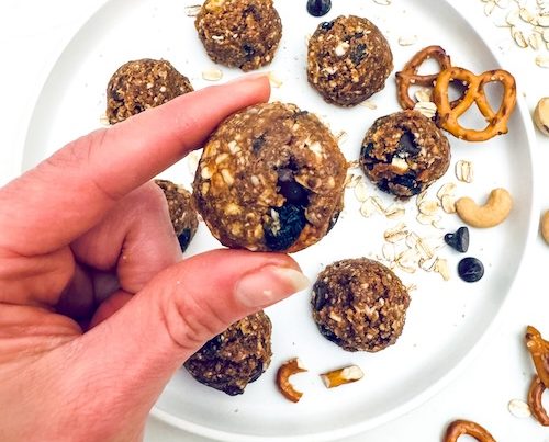Trail mix energy bites on a plate.