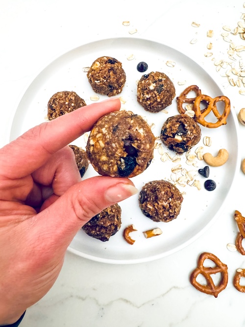 Trail mix energy bites on a plate.