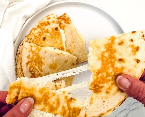 Grilled cheese quesadilla on a plate.