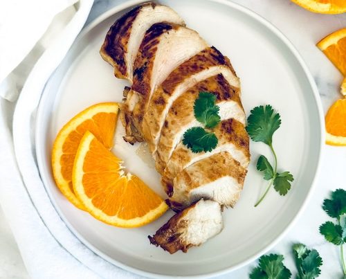 Sliced cilantro orange flavored chicken.