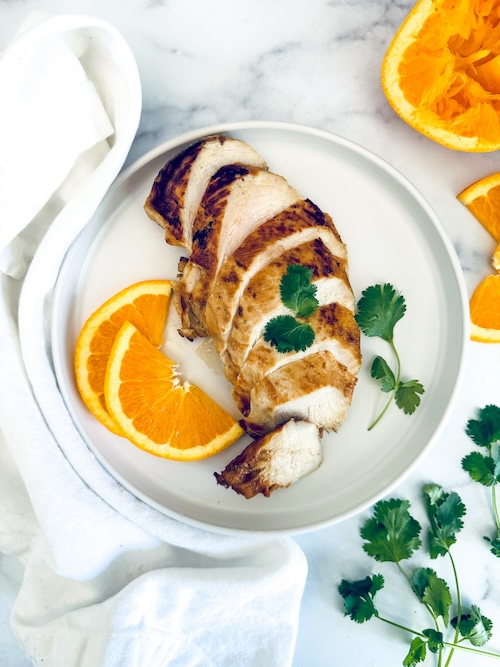 Sliced cilantro orange flavored chicken.