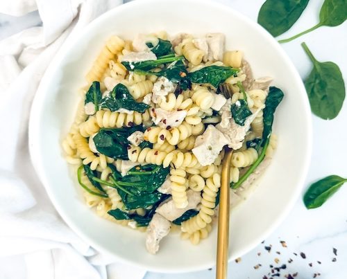 Creamy greek-style pasta in a bowl.