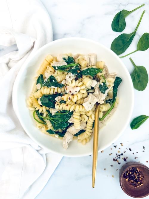 Creamy greek-style pasta in a bowl.