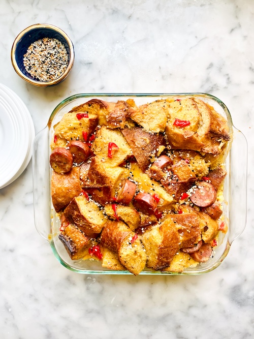 Sausage egg and cheese bake in a casserole dish.