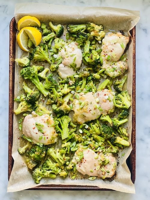 Hot honey chicken and broccoli on a sheet pan.