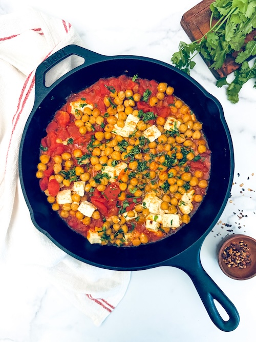 Baked feta and tomatoes with chickpeas.