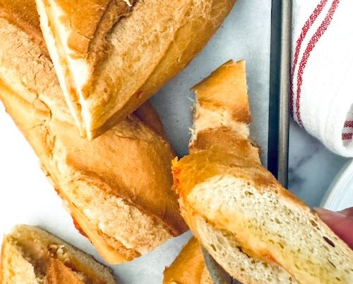 Garlic bread pizza slices.