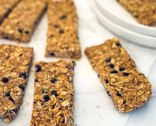 Breakfast granola bars on parchment paper.