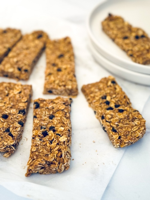Breakfast granola bars on parchment paper.