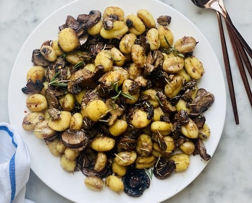 Mushroom gnocchi in a large bowl.