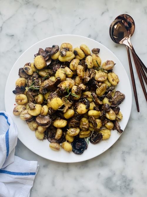 Mushroom gnocchi in a large bowl.
