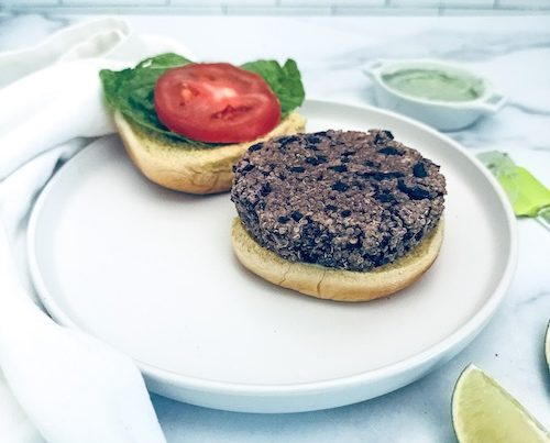 Black bean quinoa burger on a bun.