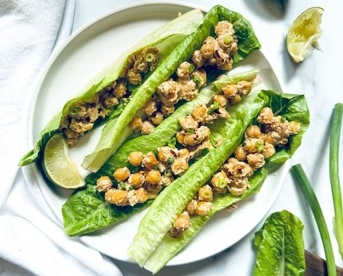 Spicy chickpea lettuce wraps on a plate.
