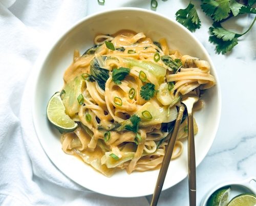 A bowl of spicy coconut milk noodles.