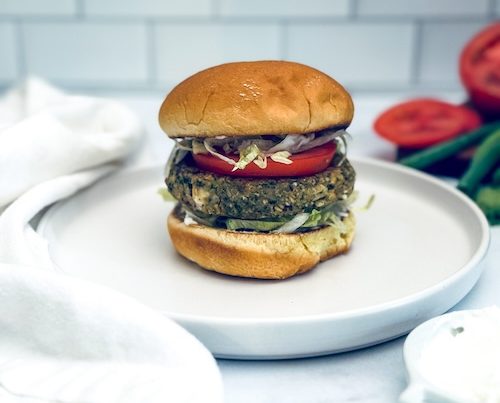 Vegan chickpea patty on a bun.