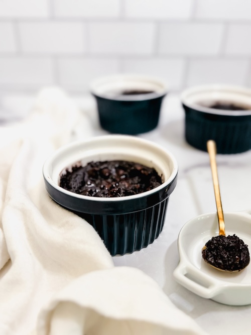 Ramekins of vegan molten chocolate lava cake.
