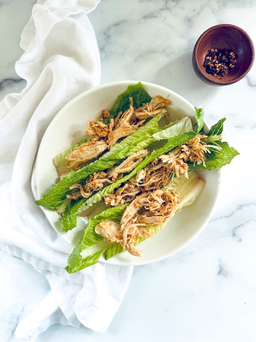 Spicy chicken in lettuce cups.