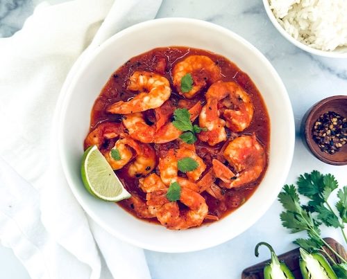 A bowl of shrimp a la mexicana.