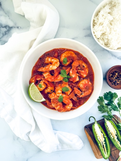 A bowl of shrimp a la mexicana.