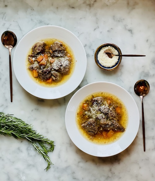 Two bowls of dijon beef soup.