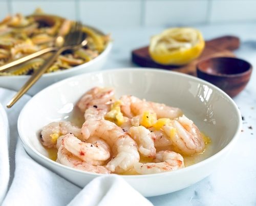 Shrimp scampi in a bowl.