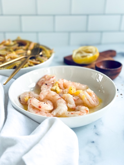 Shrimp scampi in a bowl.
