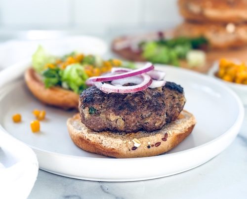 Taco burger on a plate.