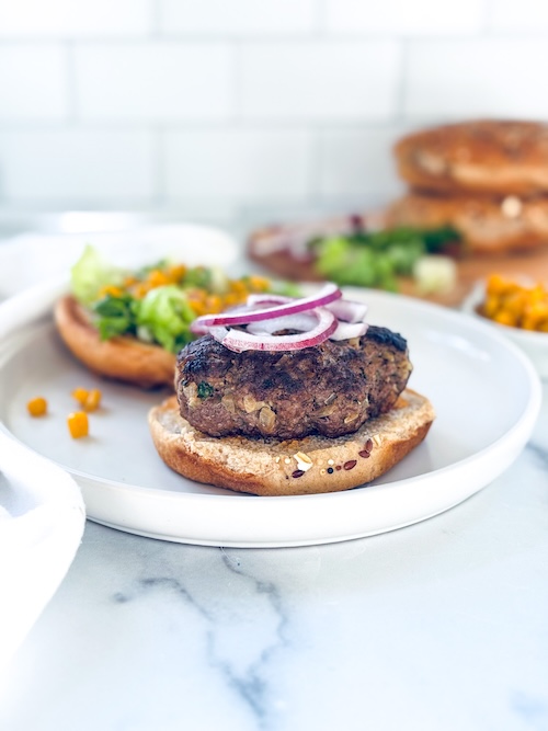 Taco burger on a plate.