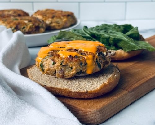 Chicken feta burger on a bun.
