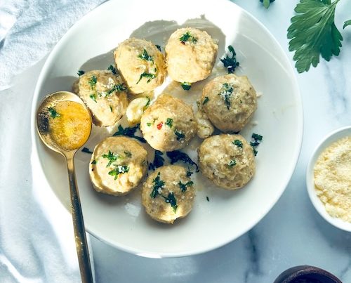 A plate of garlic butter meatballs.
