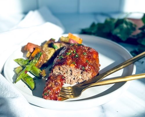 Mini meatloaf on a plate.
